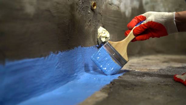SJ Waterproofing Pros commercial waterproofing team near Greensboro, AL